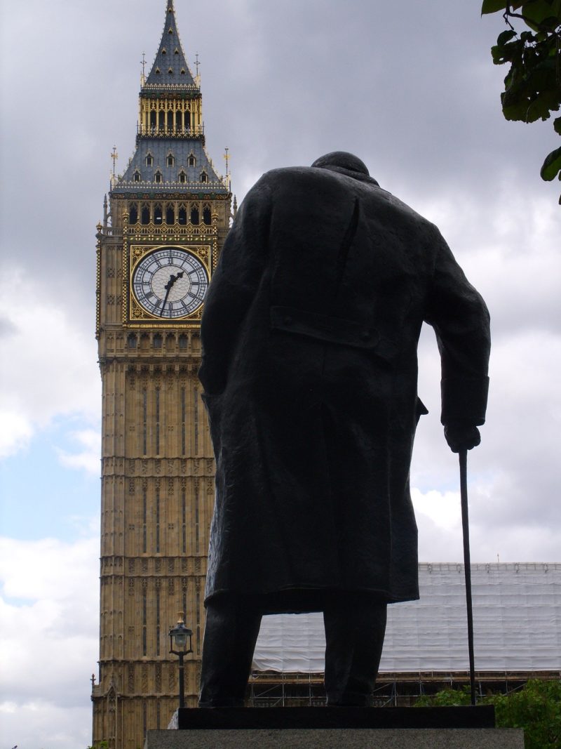 The statue of Winston Churchill in Parliament Square overlooking Big Ben.